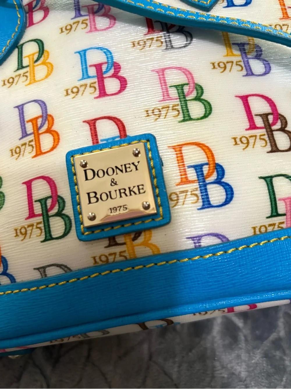 Dooney & Bourke 1975 Logo Bag Domed Crossbody Ruby Top Handle Wht/ Multi Zip Top
